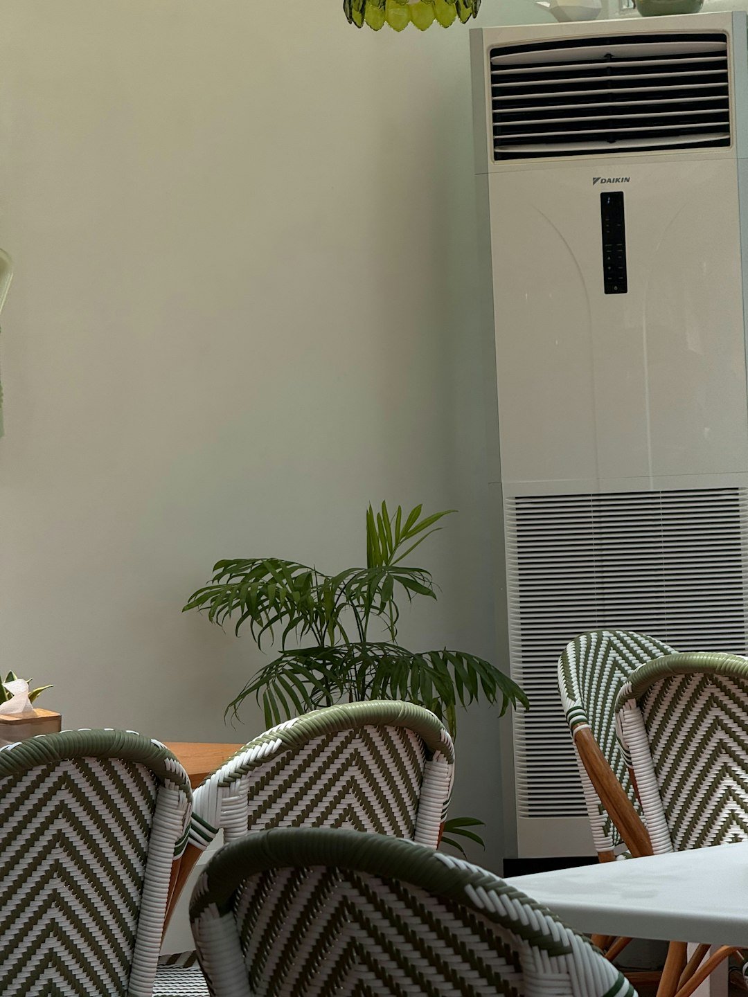 chairs-and-tall-air-conditioner-in-a-room-kbkwi7pm3be